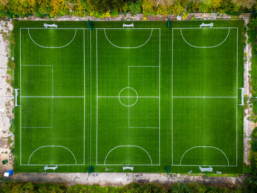 Logo printed on sports surface with Visual Turfs AirPrint Technology ColorPrint